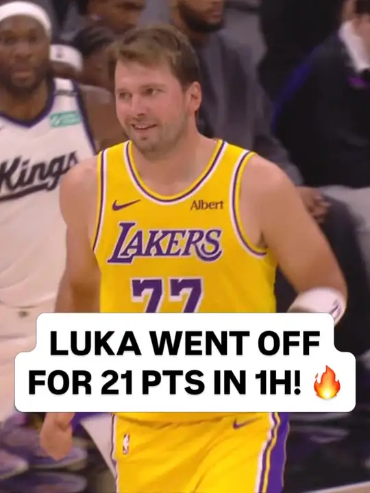 NBA 官方 Instagram 貼文：身穿湖人金色 77 號球衣的 Luka Doncic 在場上露出笑容，圖上文字標示他上半場攻下 21 分